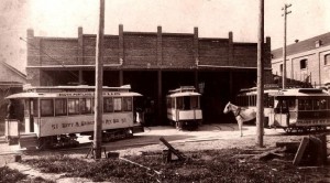 Electric_and_horse-drawn_streetcars,_Portland,_Oregon_-_May_1892